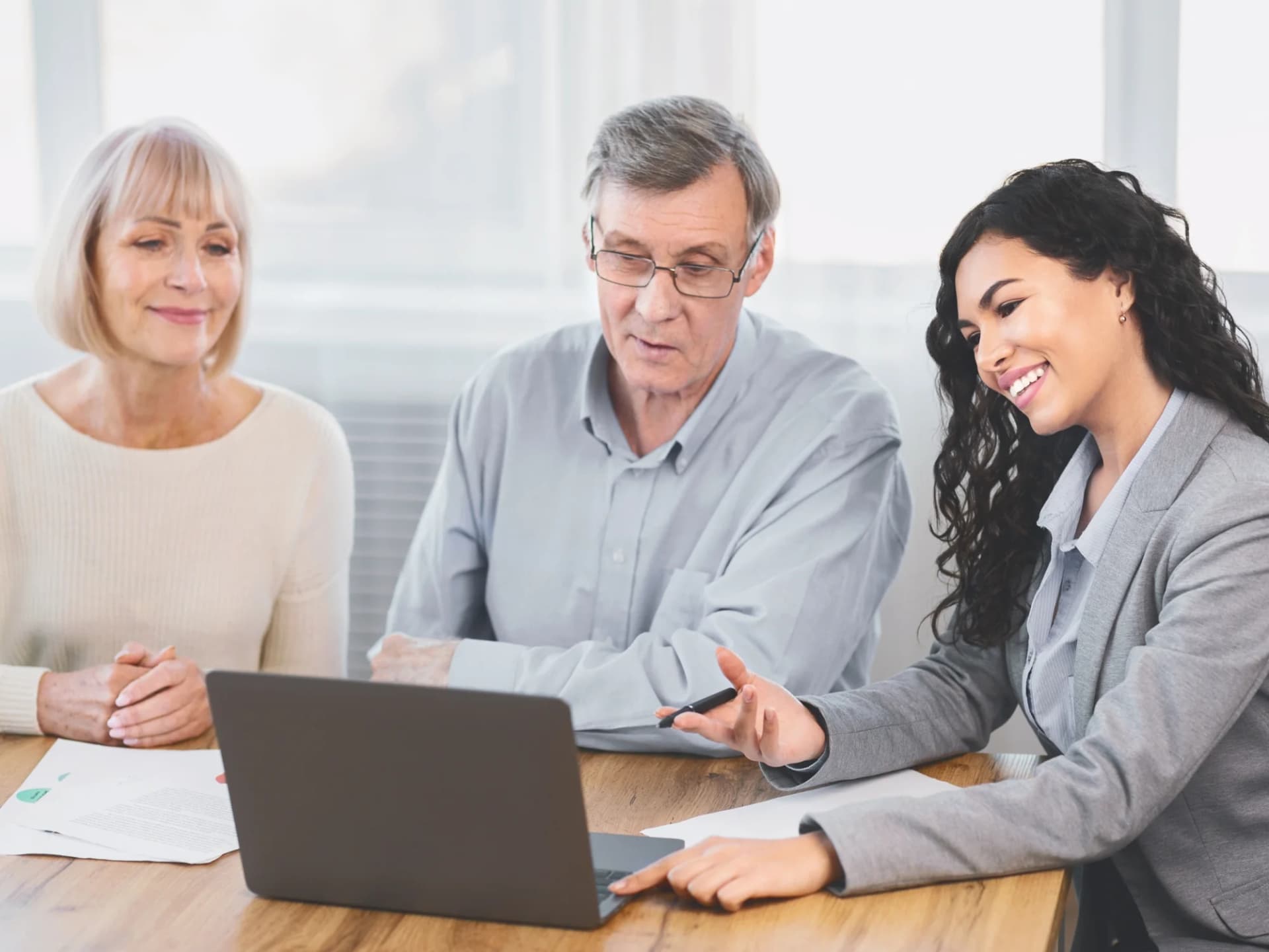 Clients going through their paperwork with their tax accountant
