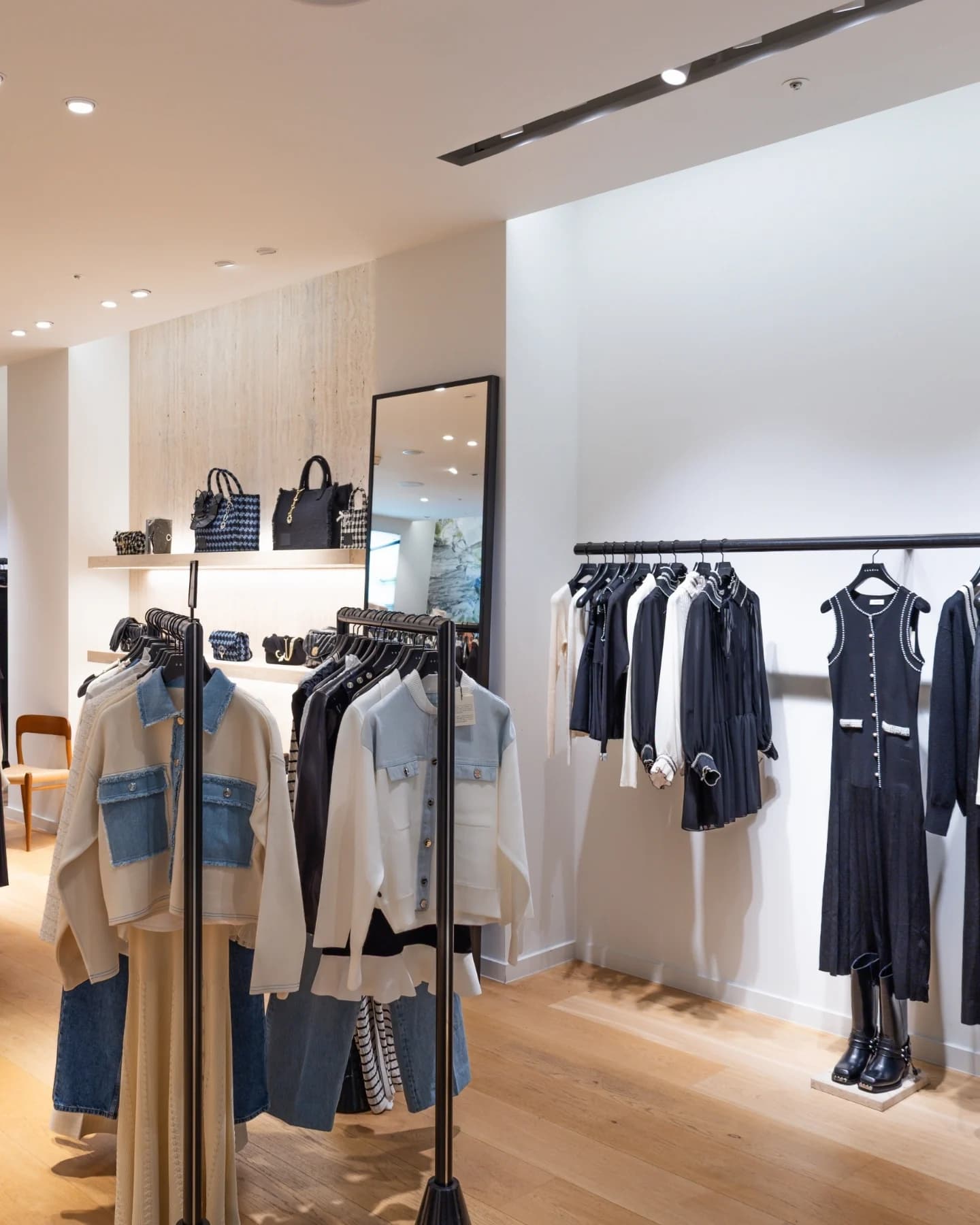Clothing rails in a minimalist boutique