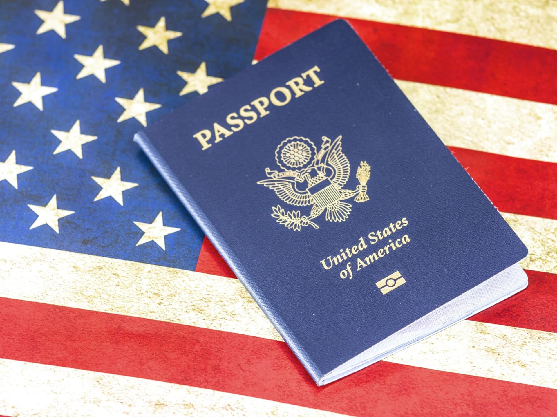 US passport on the American flag