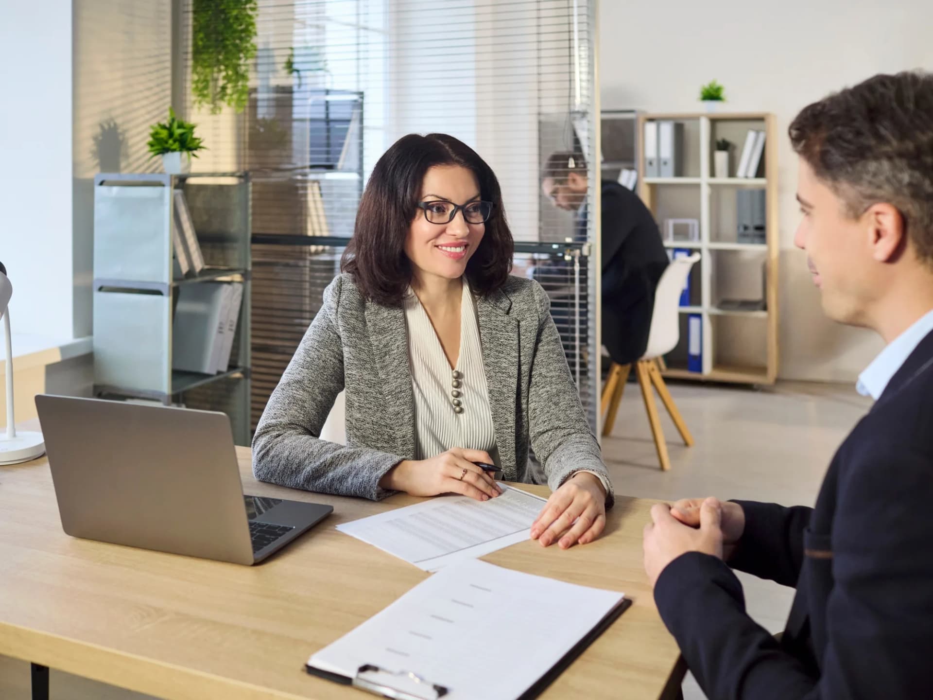 Reviewing pension paperwork with a client