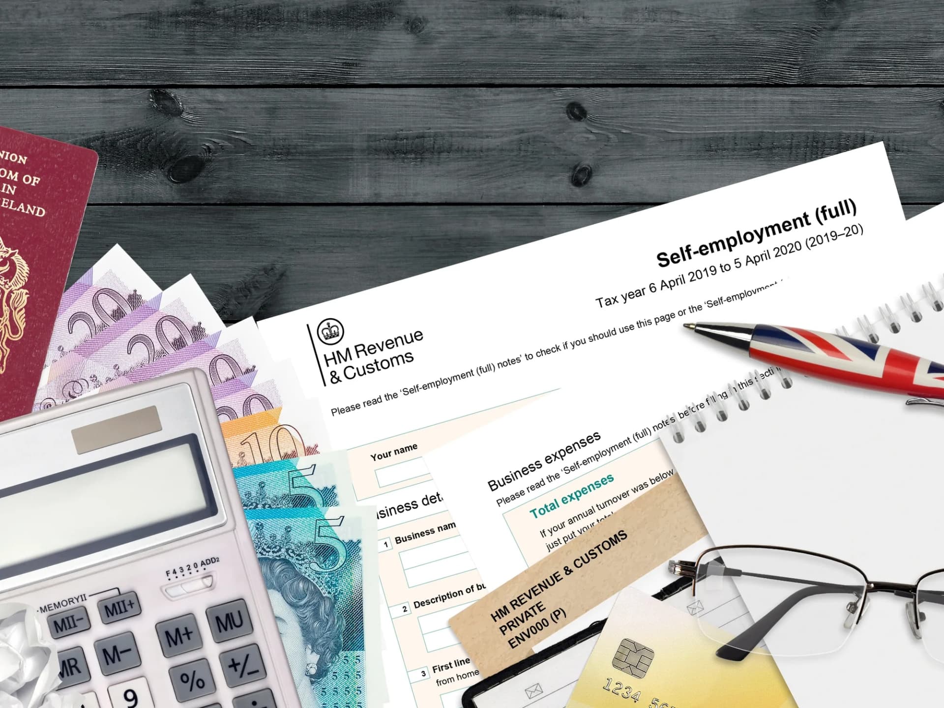 HMRC Self Assessment pages with a UK passport and calculator